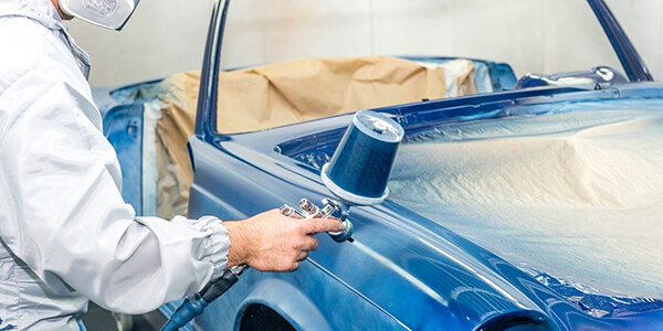 Fill the Gun with Paint Mixture and Spray Fill the Gun with Paint Mixture and Spray