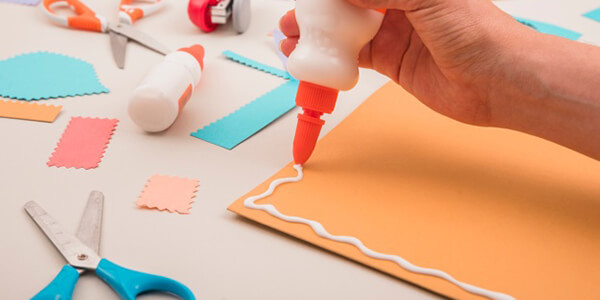 Glue use for permanent solution to prevent the cardboard from warping Glue use for permanent solution to prevent the cardboard from warping