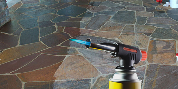 Use a blowtorch to darken flagstone Use a blowtorch to darken flagstone