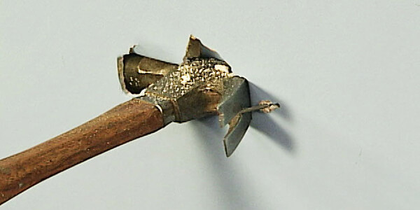 Use the hammer back to pull out the nail Use the hammer back to pull out the nail