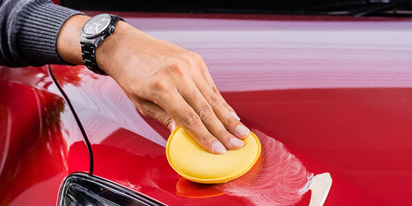 Waxing the car Waxing the car