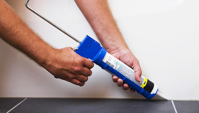 caulk to fill the window or door gap caulk to fill the window or door gap