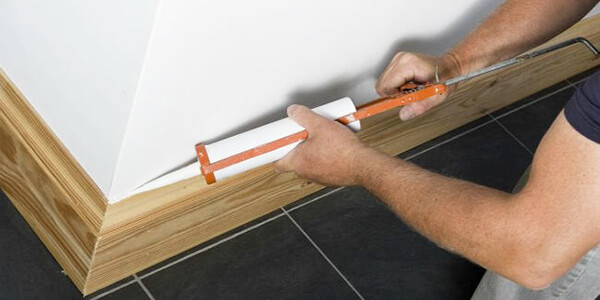 caulking the wood trim caulking the wood trim