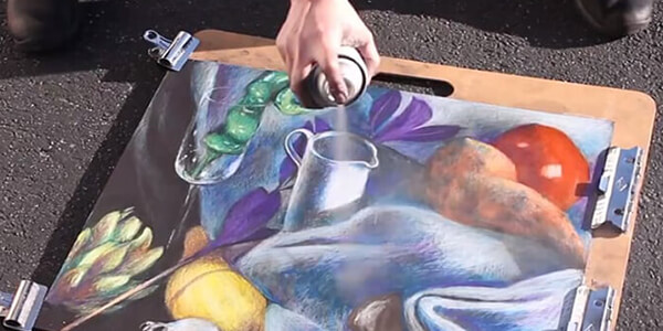 spray the varnish on the acrylic paint of cardboard spray the varnish on the acrylic paint of cardboard